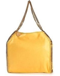 Желтая кожаная большая сумка от Stella McCartney