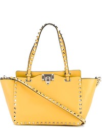 Желтая кожаная большая сумка от Valentino Garavani