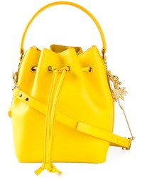 Желтая кожаная сумка-мешок от Sophie Hulme