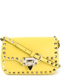 Желтая кожаная сумка через плечо от Valentino Garavani