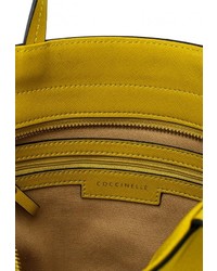 Женская желтая кожаная сумка от Coccinelle