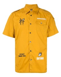 Мужская желтая рубашка с коротким рукавом с принтом от Undercover
