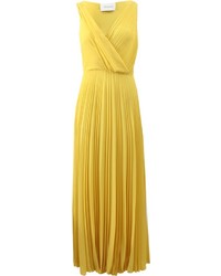 Желтое вечернее платье со складками
