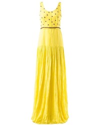Желтое вечернее платье со складками