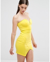 Желтое облегающее платье