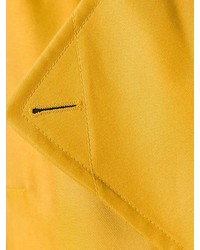 Желтое пальто без рукавов от Victoria Beckham