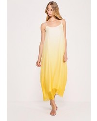 Желтое платье-макси от Kira Mesyats