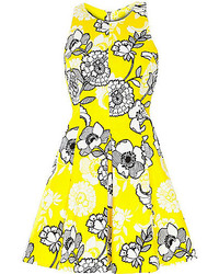Желтое платье с плиссированной юбкой с цветочным принтом
