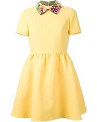 Желтое платье с плиссированной юбкой от Valentino