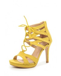 Желтые босоножки на каблуке от La Bottine Souriante