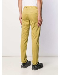 Желтые брюки чинос от Stone Island