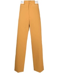 Желтые брюки чинос от Palm Angels