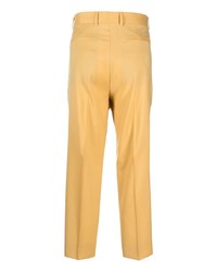 Желтые брюки чинос от Costumein