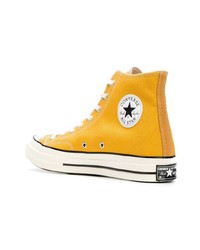 Мужские желтые высокие кеды из плотной ткани от Converse