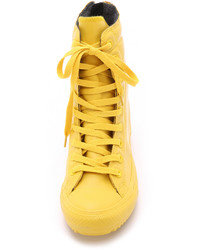 Женские желтые высокие кеды из плотной ткани от Converse