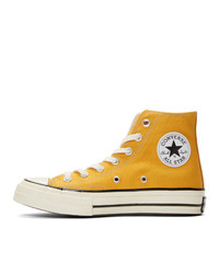 Мужские желтые высокие кеды от Converse