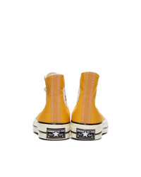 Мужские желтые высокие кеды от Converse