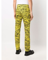 Мужские желтые джинсы с принтом от Moschino