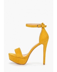 Желтые замшевые босоножки на каблуке от Bellamica