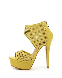 Желтые замшевые босоножки на каблуке от Fersini
