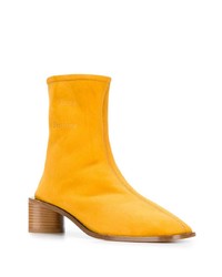 Желтые замшевые ботильоны от Acne Studios