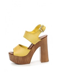 Желтые кожаные босоножки на каблуке от Bellamica