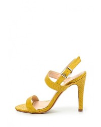 Желтые кожаные босоножки на каблуке от Catisa