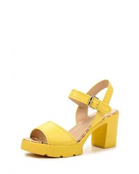 Желтые кожаные босоножки на каблуке от Dino Ricci Select