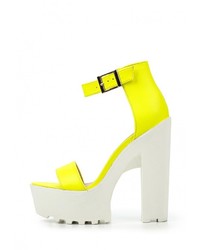 Желтые кожаные босоножки на каблуке от Tulipano