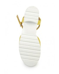 Желтые кожаные босоножки на каблуке от Wilmar