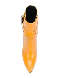 Желтые кожаные ботильоны от Bottega Veneta