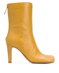 Желтые кожаные ботильоны от Bottega Veneta