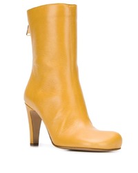 Желтые кожаные ботильоны от Bottega Veneta