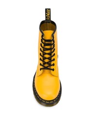 Женские желтые кожаные ботинки на шнуровке от Dr. Martens