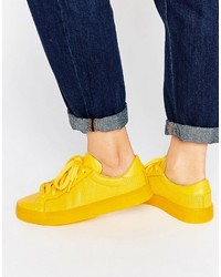 Женские желтые кожаные кеды от adidas