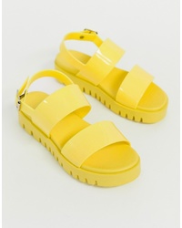 Желтые кожаные массивные сандалии на плоской подошве от ASOS DESIGN