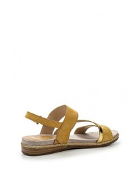 Желтые кожаные сандалии на плоской подошве от Caprice
