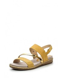 Желтые кожаные сандалии на плоской подошве от Caprice