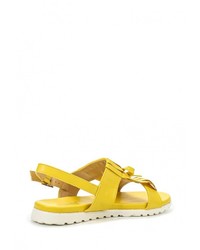 Желтые кожаные сандалии на плоской подошве от Donna Moda