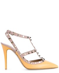Желтые кожаные туфли с шипами от Valentino