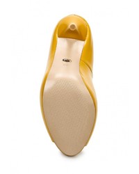 Желтые кожаные туфли от Vitacci