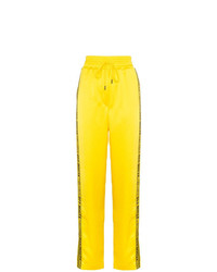 Женские желтые спортивные штаны в вертикальную полоску от Off-White