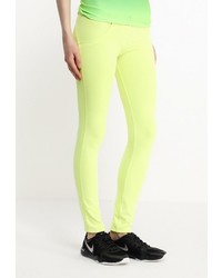 Желтые узкие брюки от Freddy