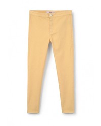 Желтые узкие брюки от Mango
