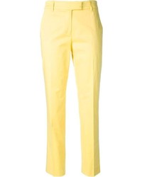 Желтые узкие брюки от Moschino