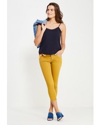 Желтые узкие брюки от Motivi