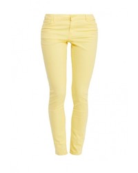 Желтые узкие брюки от Sela