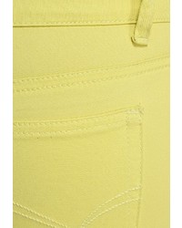 Желтые узкие брюки от Troll