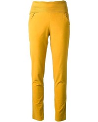 Желтые узкие брюки
