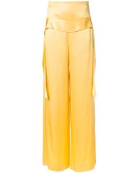 Желтые широкие брюки